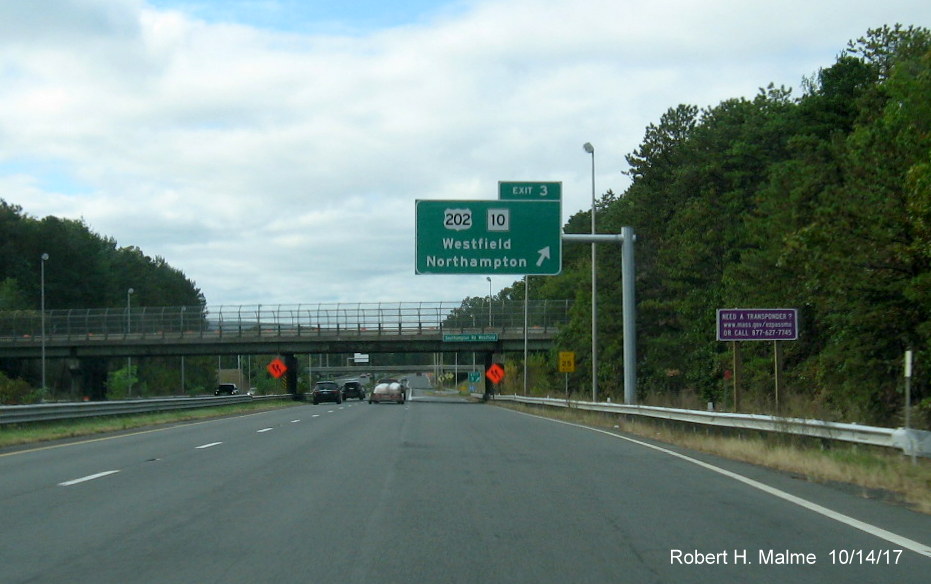 Image of newly placed overhead exit ramp signage for US 202/MA 10 ramp on I-90/Mass Pike West in Westfield