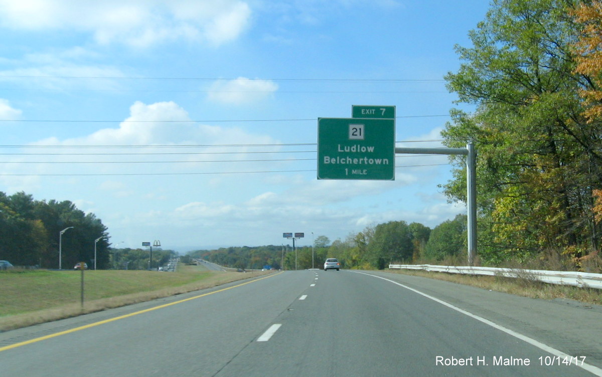 Image of newly placed 1-Mile advance overhead sign for MA 21 exit on I-90/Mass Pike West in Ludlow