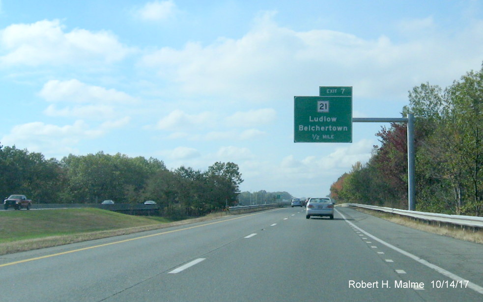Image of newly placed 1/2 Mile Advance overhead sign for MA 21 exit on I-90/Mass Pike West in Ludlow