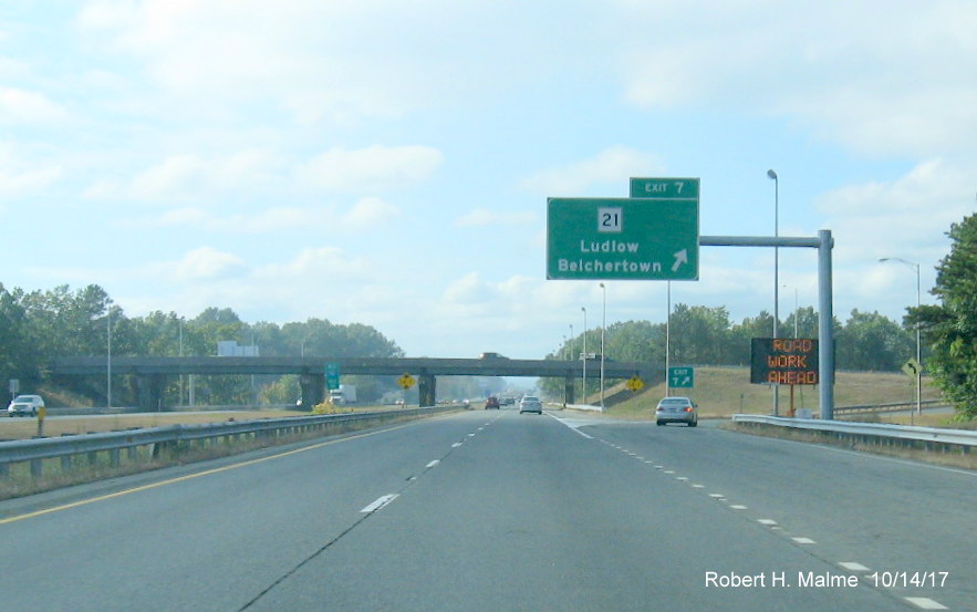 Image of newly placed overhead exit ramp sign for MA 21 on I-90/Mass Pike West in Ludlow