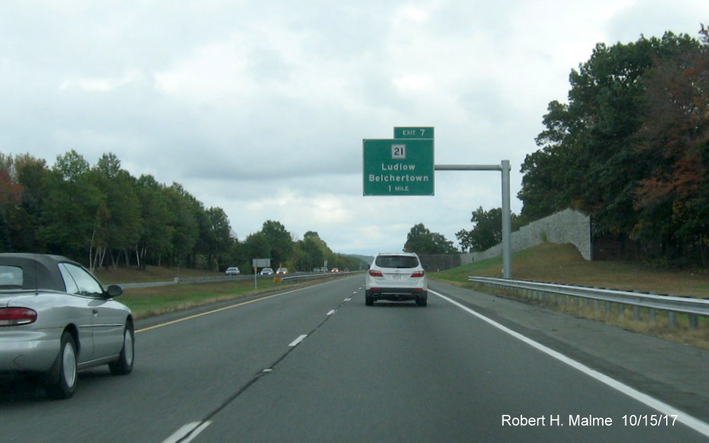 Image of newly placed 1-Mile Advance overhead sign for MA 21 exit on I-90/Mass Pike East in Ludlow