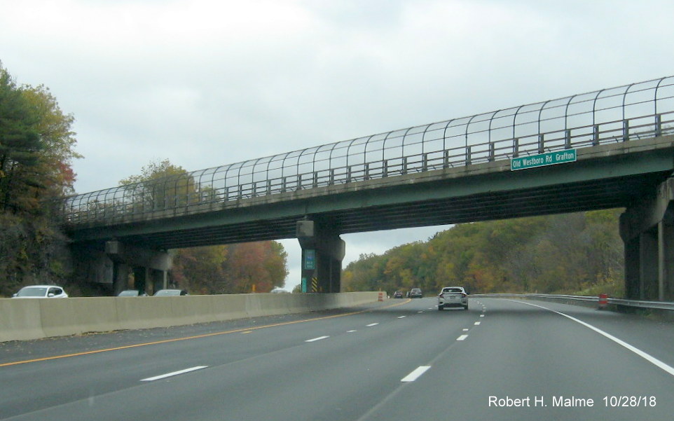 Image of enhance milemarker for Mile 100 on bridge over I-90/Mass Pike East in Grafton