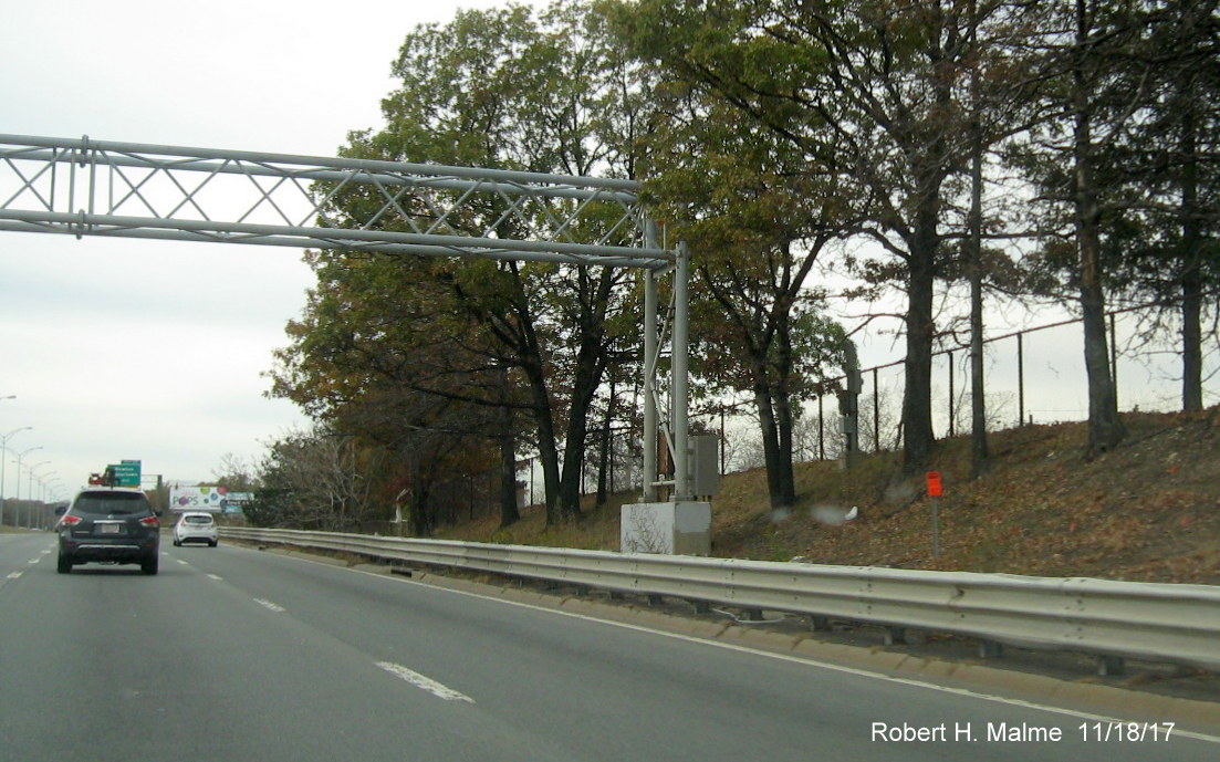 Image of overhead sign placement contractor tag along I-90 West in Newton