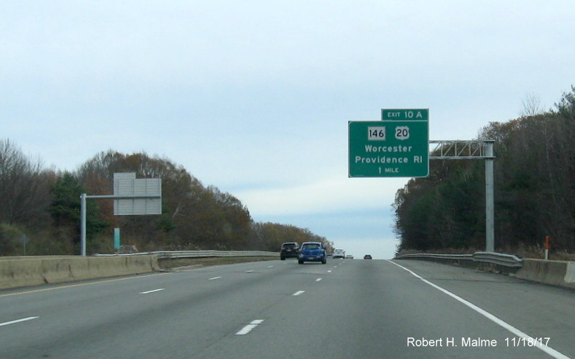 Image of newly placed 1-mile advance overhead sign for MA 146/US 20 exit on I-90 East in Worcester