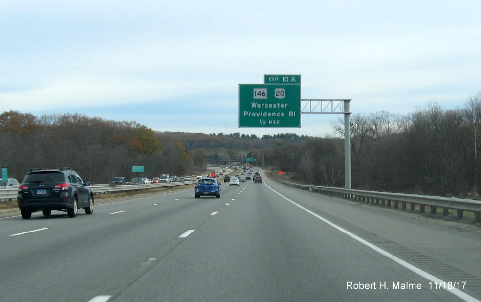 Image of newly placed 1/2 mile advance overhead sign for MA 146/US 20 exit on I-90 East in Worcester