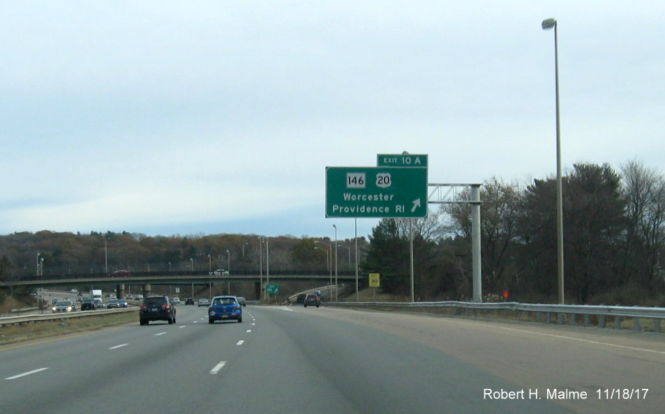 Image of newly placed overhead off-ramp sign for MA 146/US 20 exit on I-90 East in Worcester