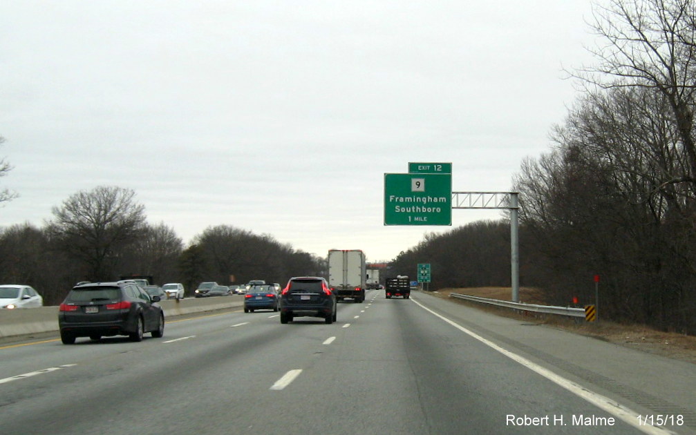 Image of newly placed 1-mile advance overhead sign for MA 9 exit on I-90/Mass Pike West in Framingham