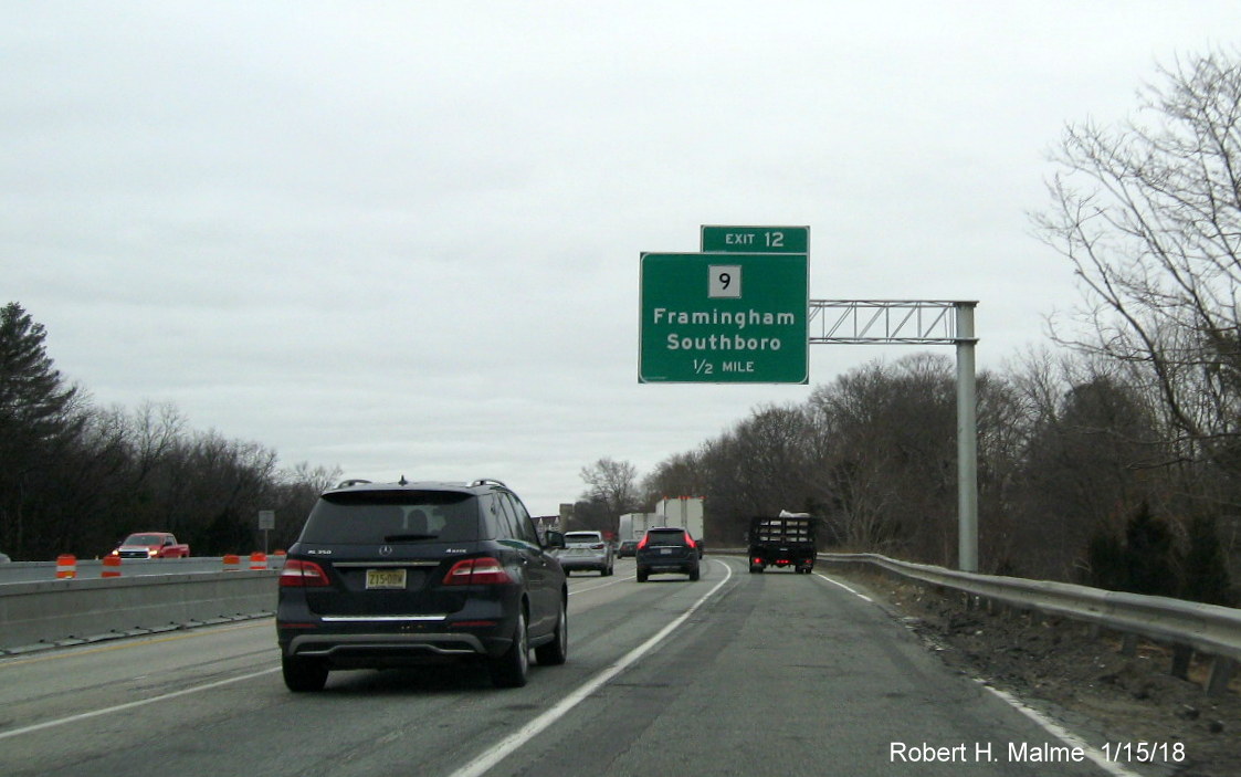 Image of newly placed 1/2 mile advance overhead sign for MA 9 exit on I-90/Mass Pike West in Framingham