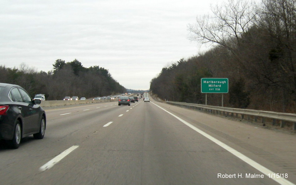 Image of existing auxiliary sign for I-495 exit on I-90/Mass Pike West in Westborough