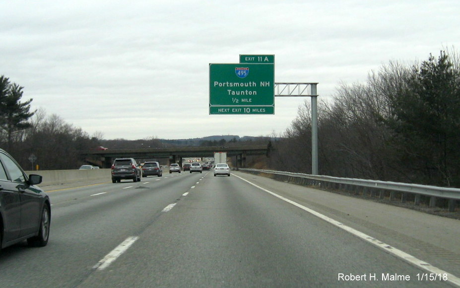 Image of recently placed 1/2 mile advance sign, with next exit distance tab, for I-495 exit on I-90/Mass Pike West in Westborough