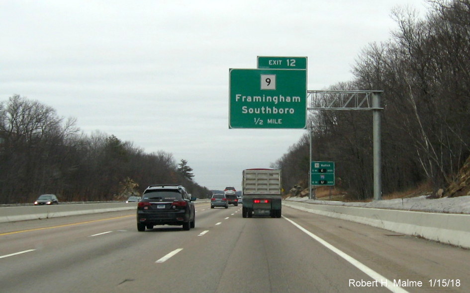 Image of newly placed 1/2 mile advance overhead sign for MA 9 exit on I-90/Mass Pike East in Framingham