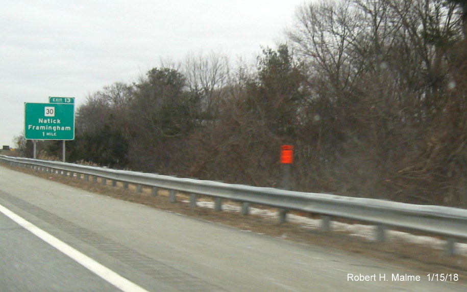 Image of contractor placement tag for future 1-mile advance overhead sign for MA 30 exit on I-90/Mass Pike East in Natick
