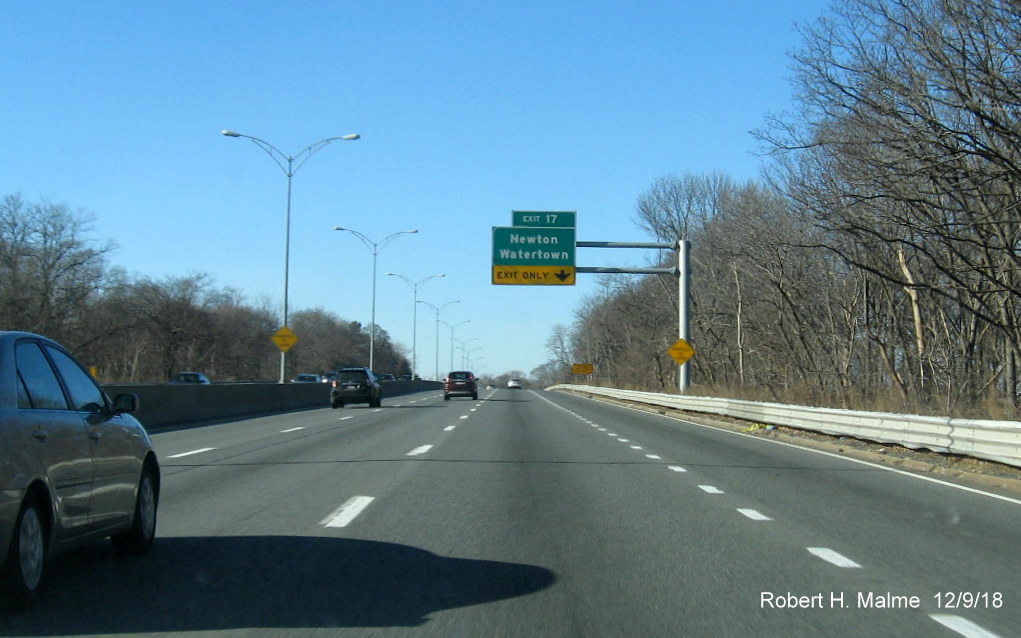 Image of corrected 1/2 mile advance overhead sign, now featuring arrow over correct exit only lane on I-90/Mass Pike West in Newton