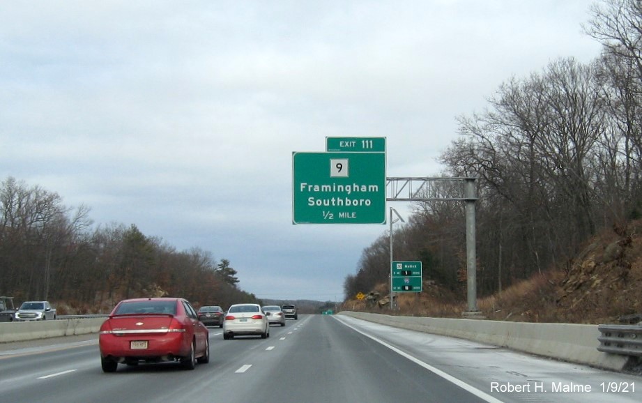 Image of 1/2 Mile advance overhead sign with new milepost based exit number on MA 9 exit in Framingham, January 2021