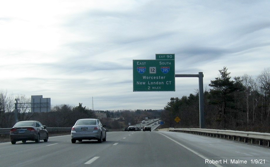 Image of 2-miles advance overhead sign for I-290/I-395/MA 12 exit with new milepost based exit number on I-90/Mass Pike West in Auburn, by Vinh Lam, December 2020