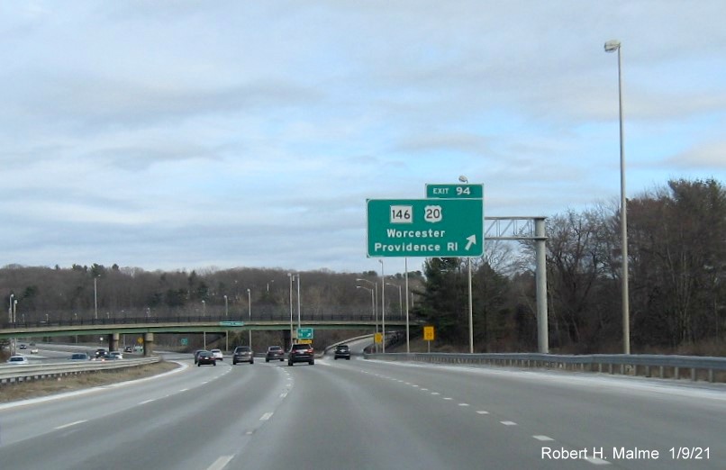 Image of overhead ramp sign for US 20/MA 146 exit with new milepost based exit number on I-90/Mass Pike East in Worcester, January 2021