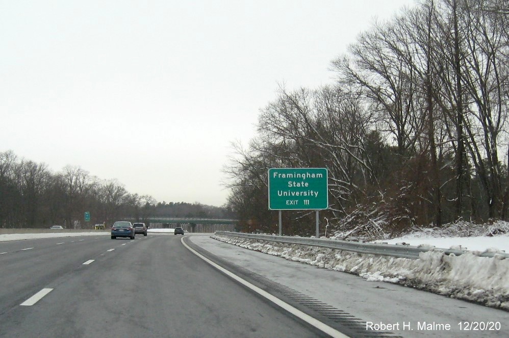 Image of auxiliary sign for MA 9 exit with new milepost based exit number on I-90/Mass Pike West in Framingham, December 2020