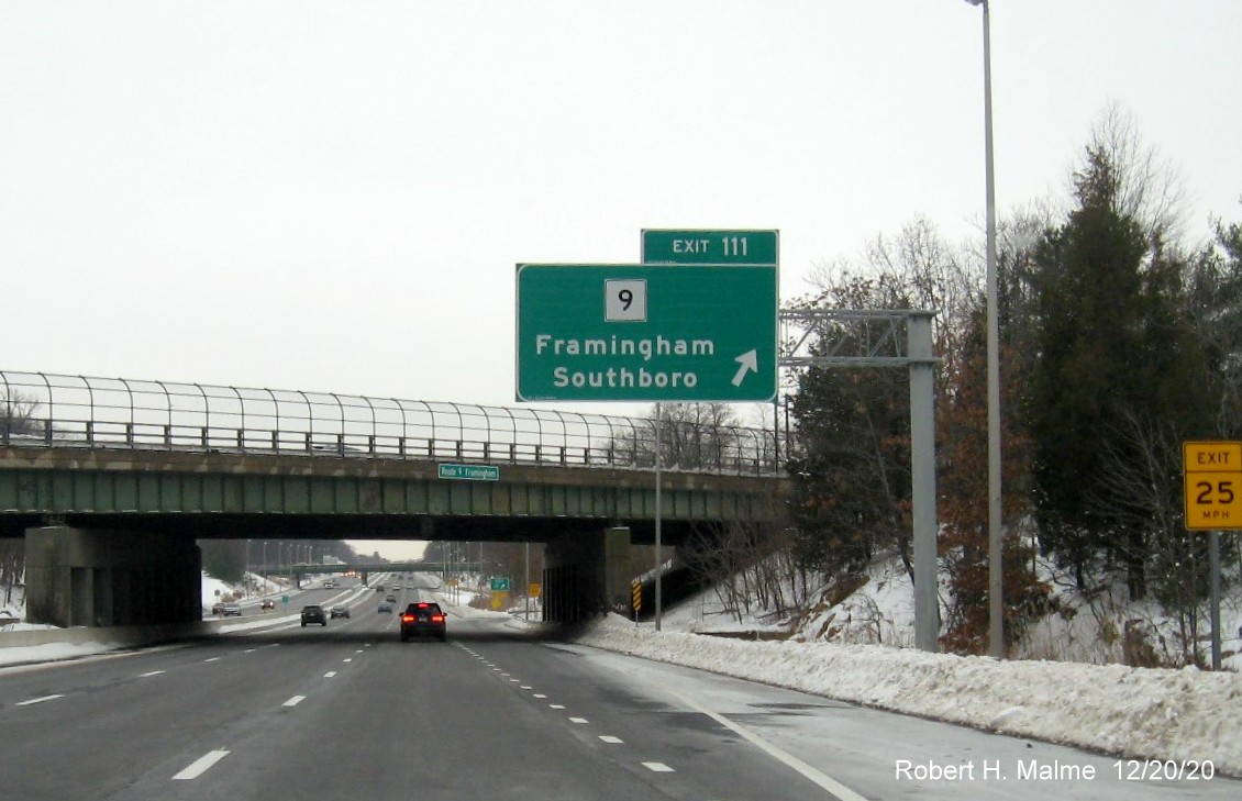 Image of overhead ramp sign for MA 9 exit with new milepost based exit number on I-90/Mass Pike West in Framingham, December 2020