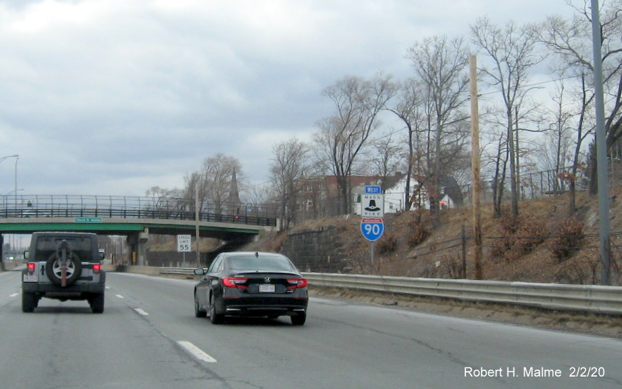 Image of new reassurance marker for West I-90Mass Pike after Newton/Watertown exit with Massachusetts Turnpike logo sign on top
