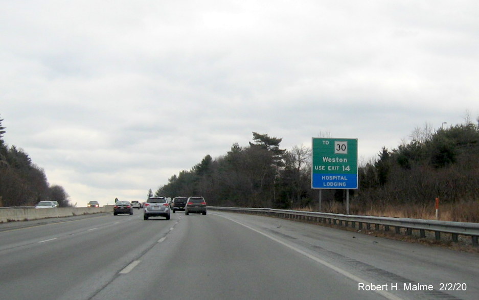 Image of recently placed ground mounted auxiliary sign for I-95 exit on I-90/Mass Pike East in Weston