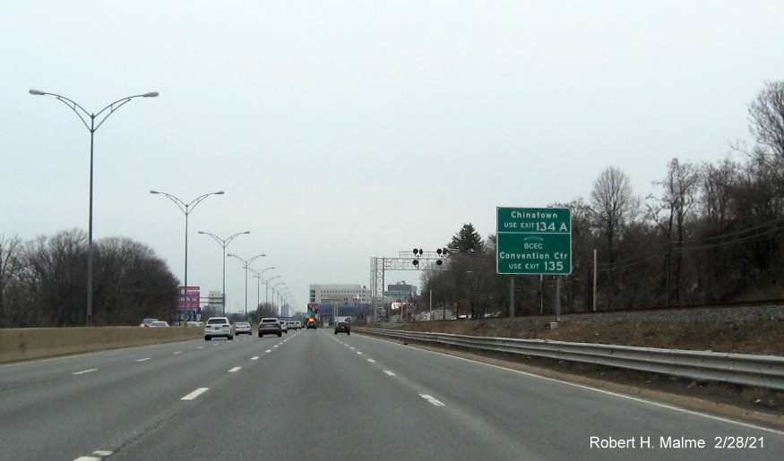 Image of auxilary sign for I-93 and South Boston exits with new milepost based exit numbers on I-90 East in Allston-Brighton, January 2021