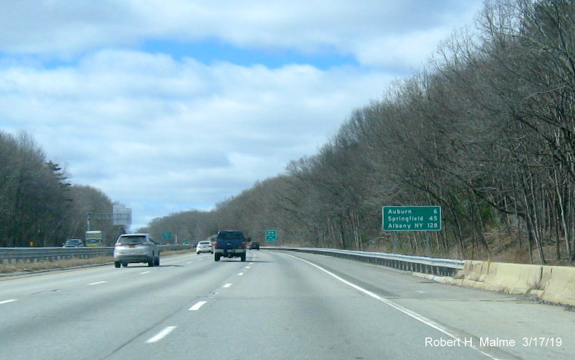 Image of post-interchange distance sign following MA 122 exit on I-90/Mass Pike West in Millbury