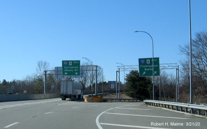 Image of overhead signs at split of ramps from I-495 to I-90/Mass Pike in Hopkinton