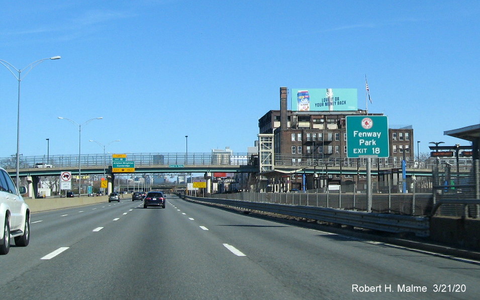 Image of Mass Guide/Paddle sign version of auxiliary sign for Allston/Brighton/Cambridge exit on I-90/Mass Pike East in Brighton