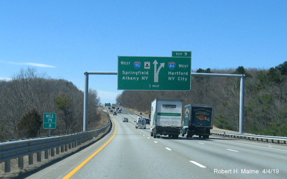 Image of 1-mile advance overhead diagrammatic sign for I-84 exit on I-90/Mass Pike West in Charlton