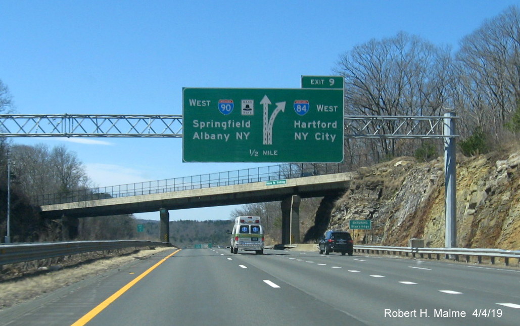 Image of 1/2 mile advance overhead diagrammatic sign for I-84 exit on I-90 West in Sturbridge