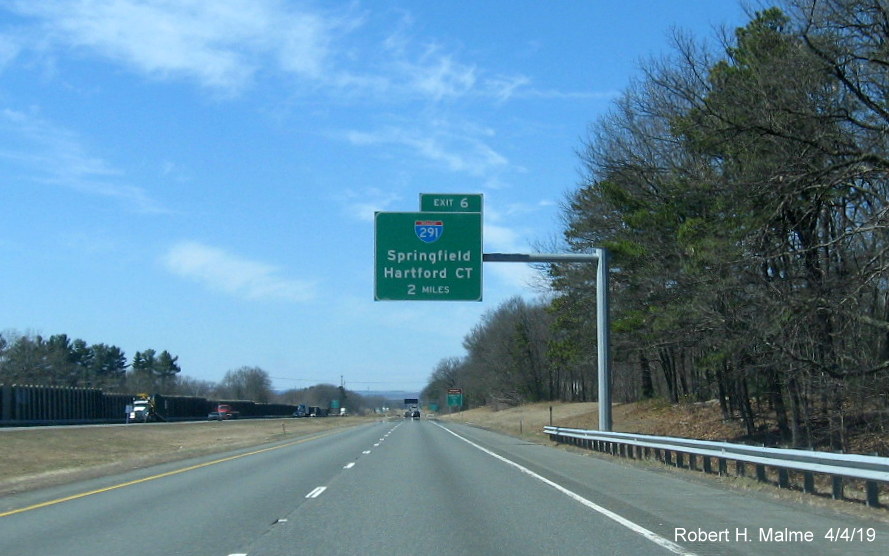 Image of recently placed 2-mile advance overhead sign for I-291 exit on I-90/Mass Pike West in Springfield