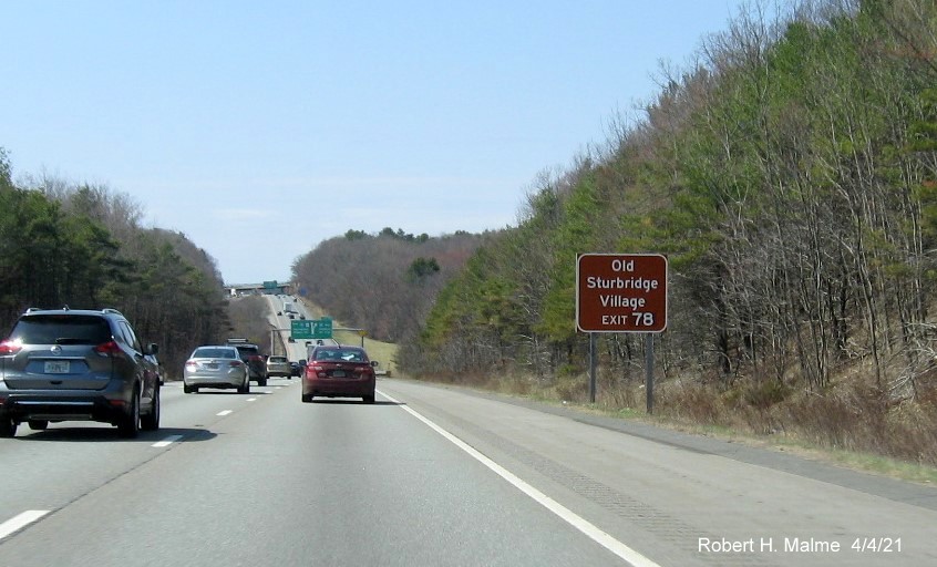 Image of Olde Sturbridge Village auxiliary sign for I-84 exit with new milepost based exit number on I-90/Mass Pike West in Charlton, April 2021