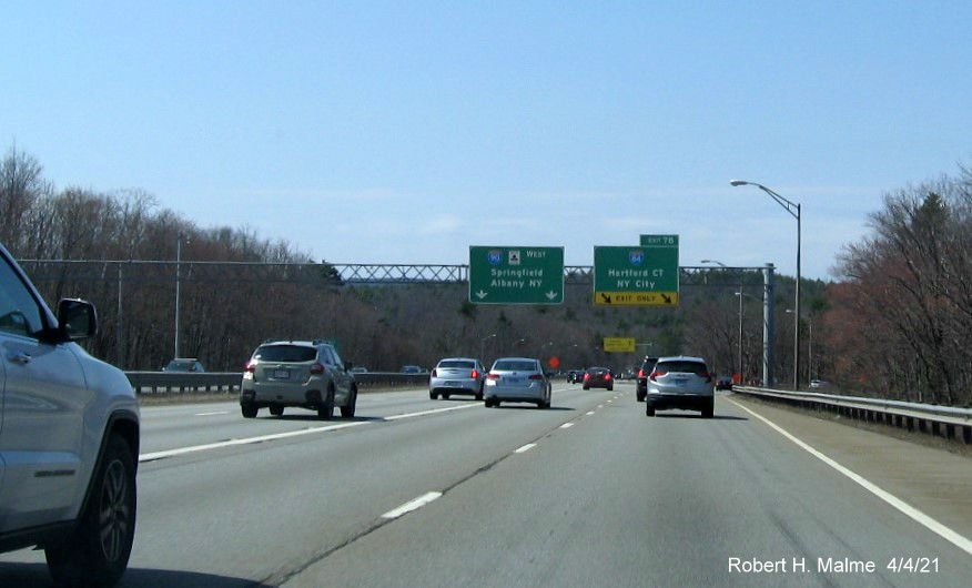 Image of overhead signage at ramo for I-84 exit with new milepost based exit number I-90/Mass Pike West in Sturbridge, April 2021