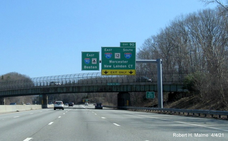 Image of overhead ramp sign for I-290/I-395/MA 12 exit with new milepost based exit number 
                                             on I-90/Mass Pike East in Auburn, April 2021