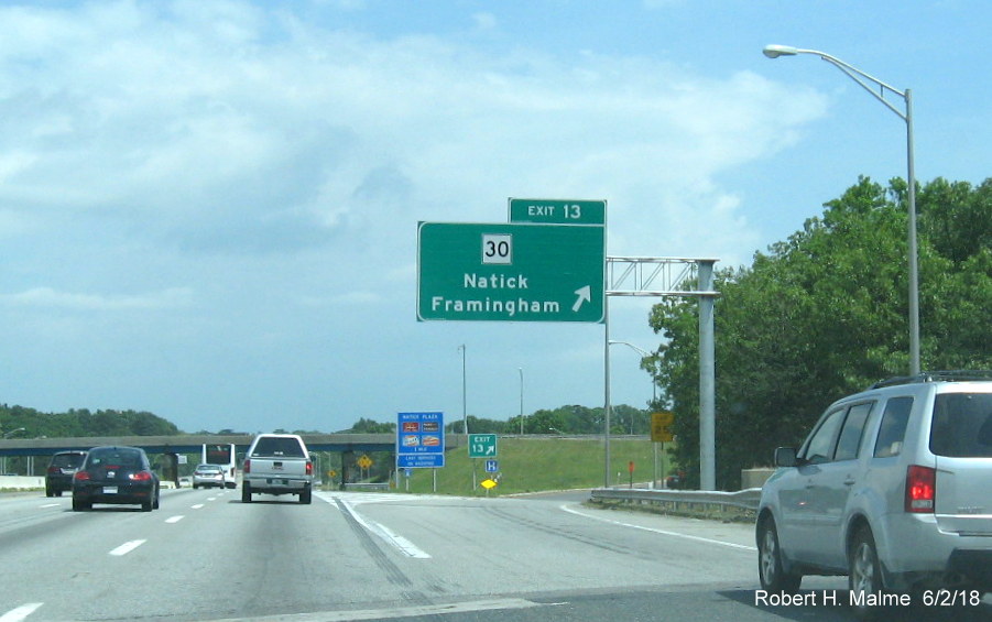 Image of newly placed overhead offramp sign for MA 30 exit on I-90/Mass Pike East in Natick