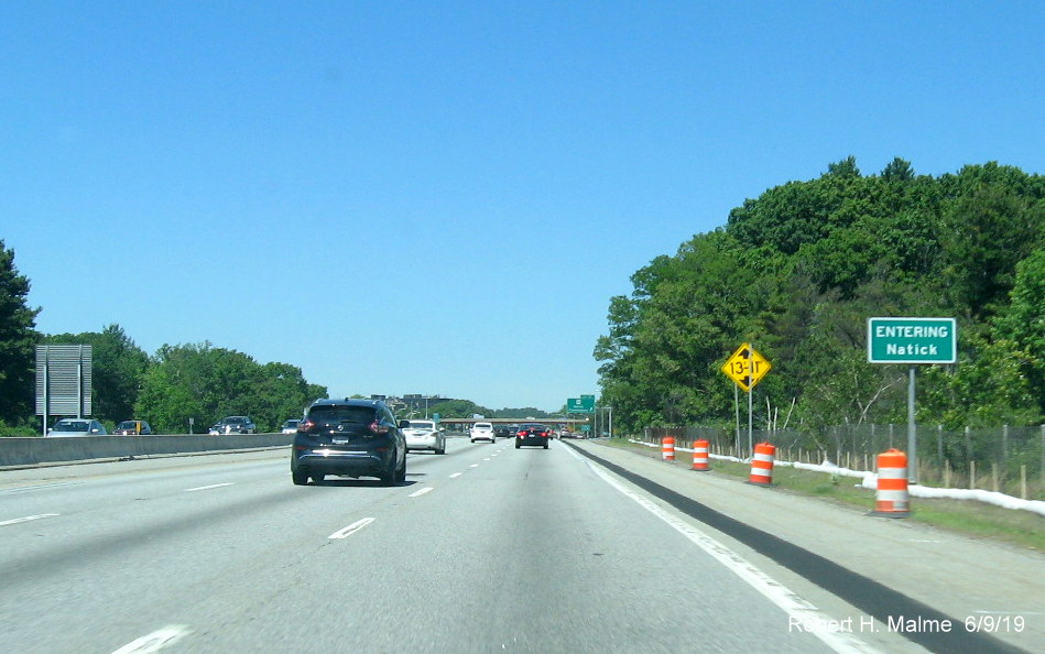 Image of recently placed ground mounted third entering Natick sign on I-90/Mass Pike West at MA 30 exit