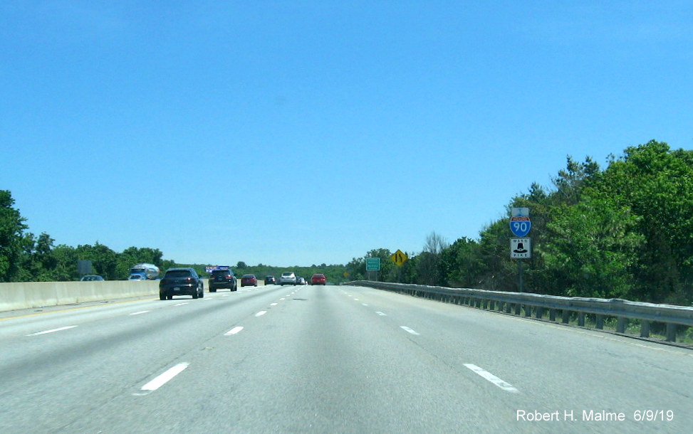 Image of new reassurance marker with old direction banner for I-90/Mass Pike East after I-495 exit in Hopkinton