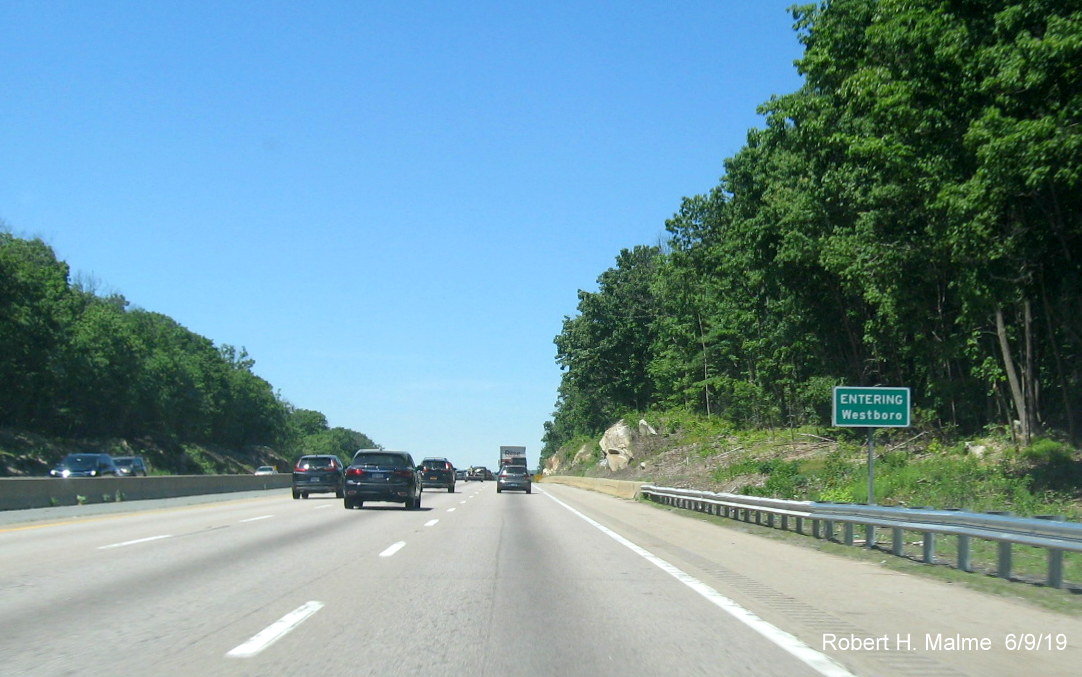 Image of recently placed jurisdictional boundary sign for Westboro(ugh) on I-90/Mass Pike West