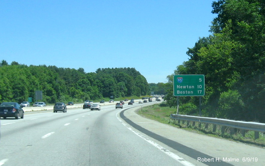Image of recently placed post-interchange distance sign on I-90/Mass Pike West after Natick Service Plaza