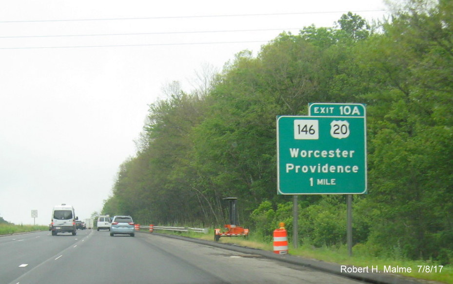 Image of current ground-mounted 1-Mile advance sign for MA 146/US 20 exit on I-90/Mass Pike West in Worcester