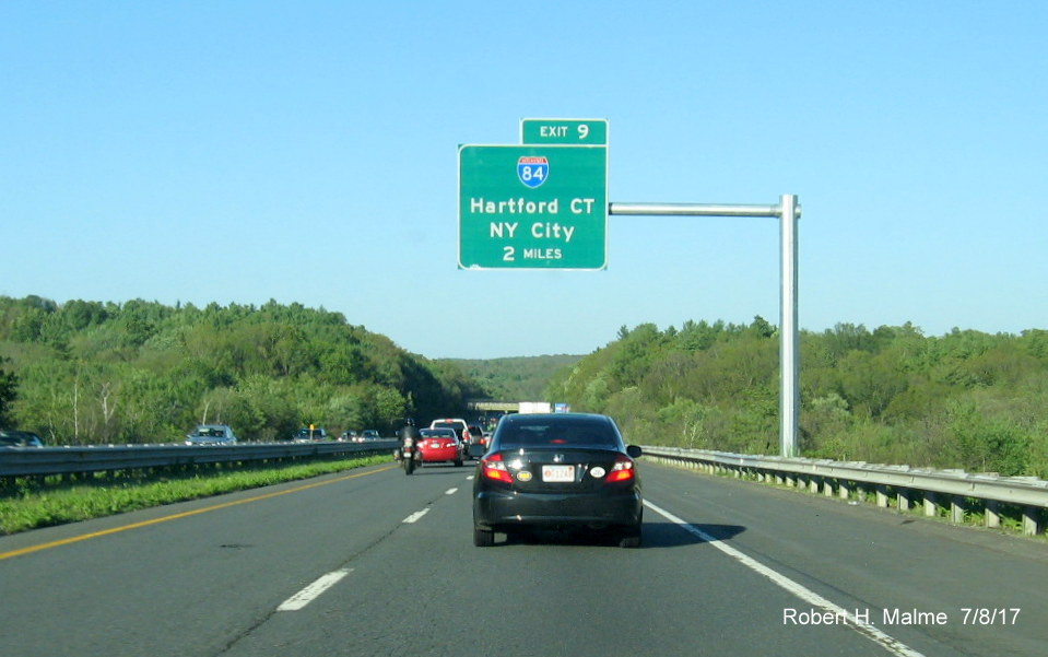 Image of newly placed 2-Mile advance sign for I-84 exit on I-90 East in Sturbridge