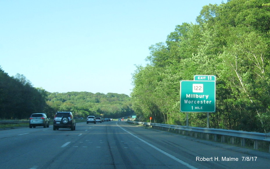 Image of contractor overhead sign support placement tag prior to MA 122 exit sign on I-90/Mass Pike East in Millbury