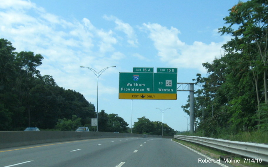 Image of newly placed 1/2 mile advance overhead sign for I-95/To MA 30 exit on I-90/Mass Pike West in Weston