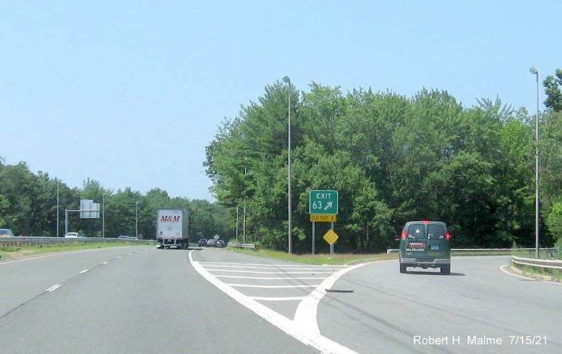 Image of gore sign for MA 32 exit with new milepost based exit number on I-90/Mass Pike West in Palmer, July 2021