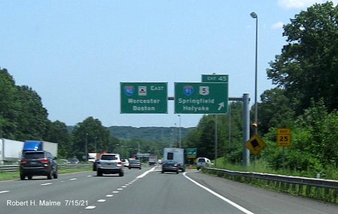 Image of overhead ramp sign for I-91/US 5 exit with new milepost based exit number on I-90/Mass Pike East in West Springfield, July 2021
