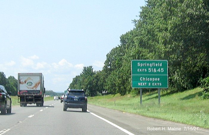 Image of green auxiliary sign for I-291 exit with new milepost based exit number on I-90/Mass Pike West in Chicopee, July 2021