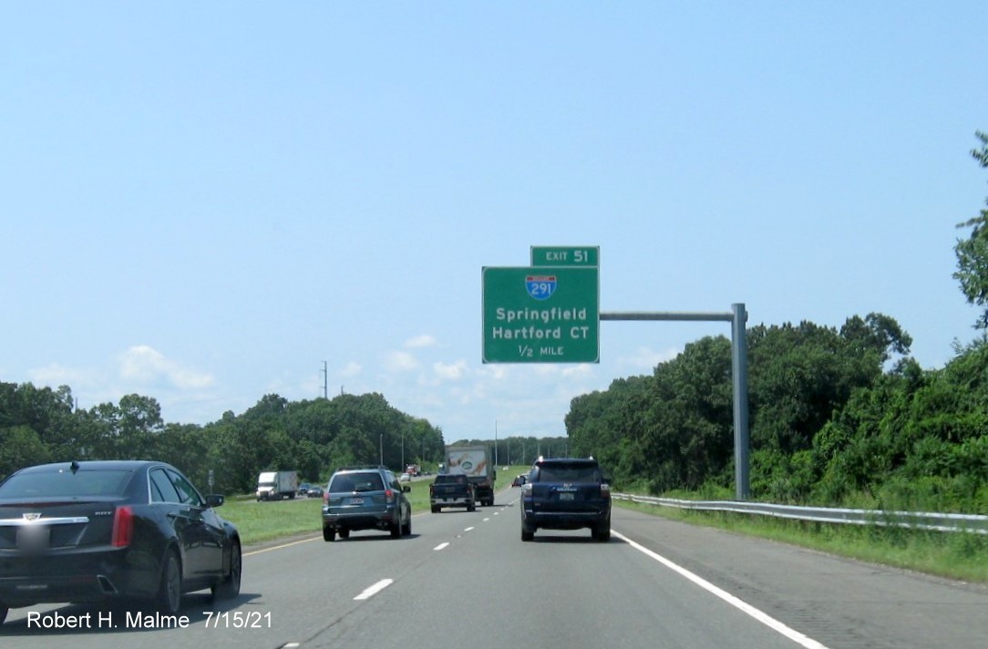 Image of 1/2 Mile advance overhead sign for I-291 exit with new milepost based exit number on I-90/Mass Pike West in Chicopee, July 2021