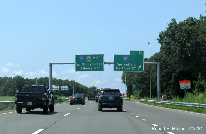 Image of overhead ramp sign for I-291 exit with new milepost based exit number and gore sign with yellow Old Exit 6 sign below on support on I-90/Mass Pike West in Chicopee, July 2021