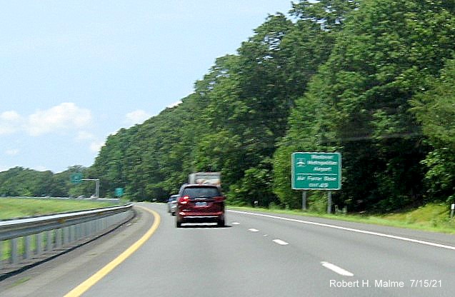 Image of auxiliary sign for MA 33 exit with new milepost based exit number on I-90/Mass Pike West in Chicopee, July 2021