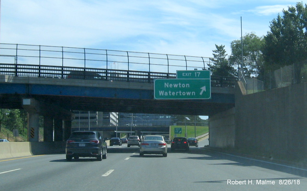 Image of new bridge mounted ramp sign for Newton/Watertown exit on I-90/Mass Pike East